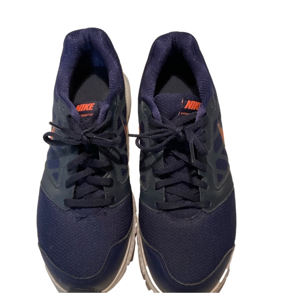 Nike Down Shifter Womens Athletic Shoe Navy Blue with orange accents. Size 9M